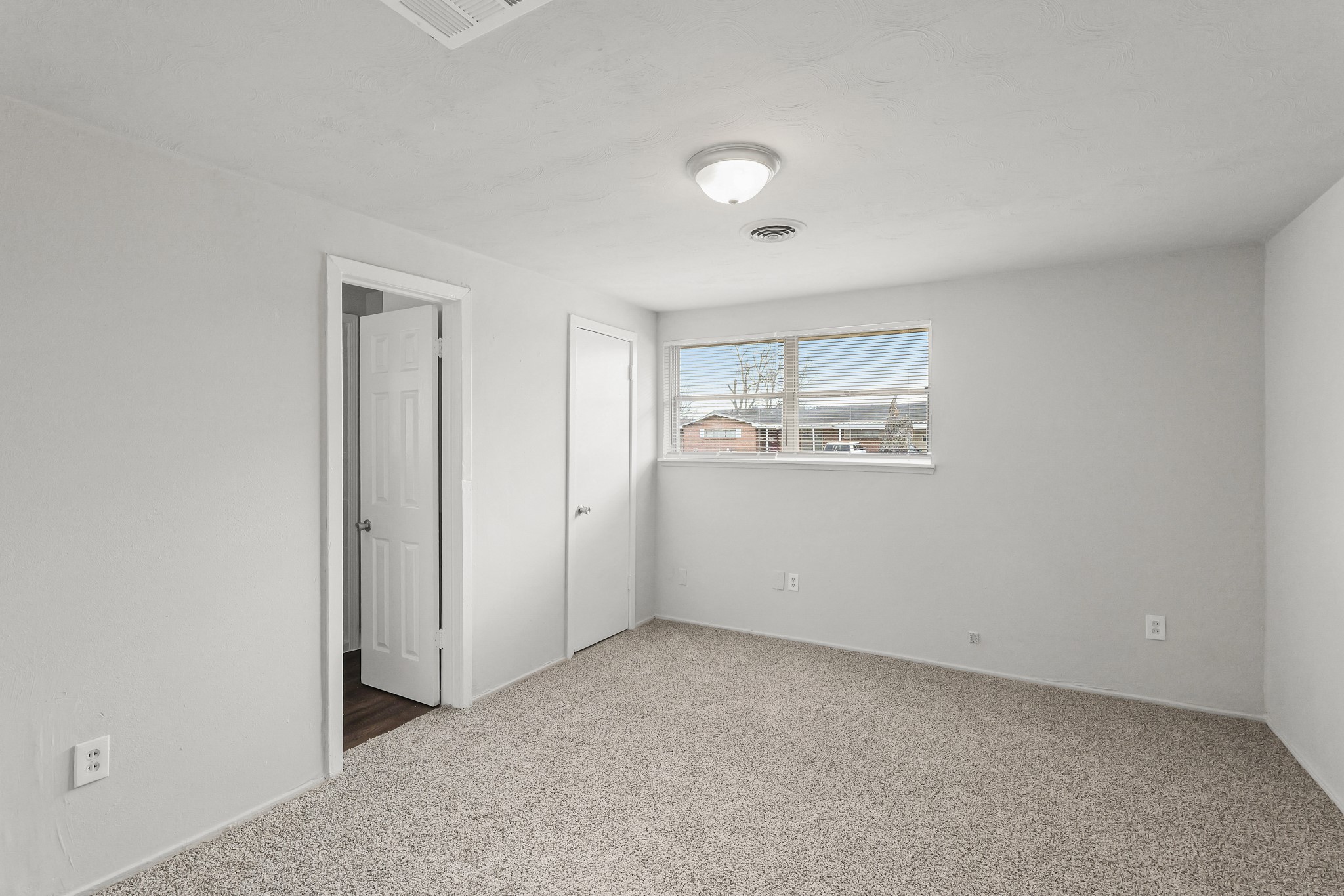 414 Grantham Road Baytown, TX 77521 - Photo 13 of 19 a view of an empty room with a window