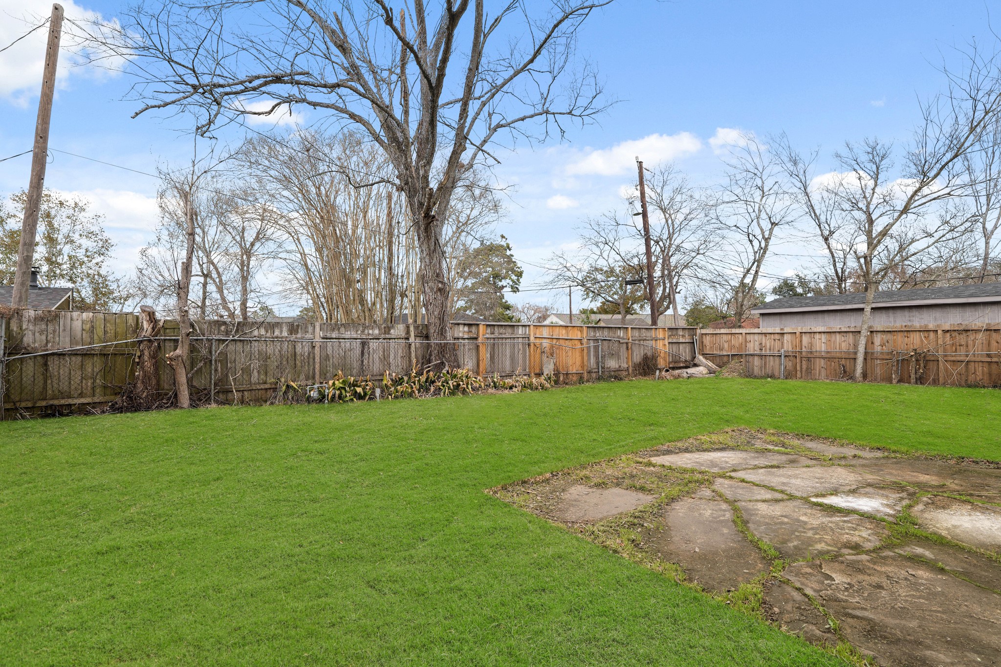 414 Grantham Road Baytown, TX 77521 - Photo 16 of 19 a view of a yard with a large trees