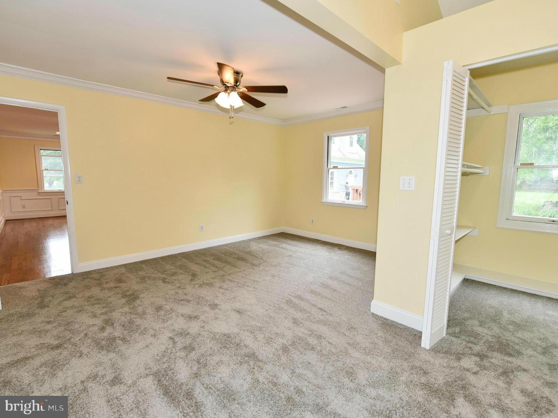 2138 Spencerville Road Spencerville, MD 20868 - Photo 14 of 30 an empty room with windows and fan view