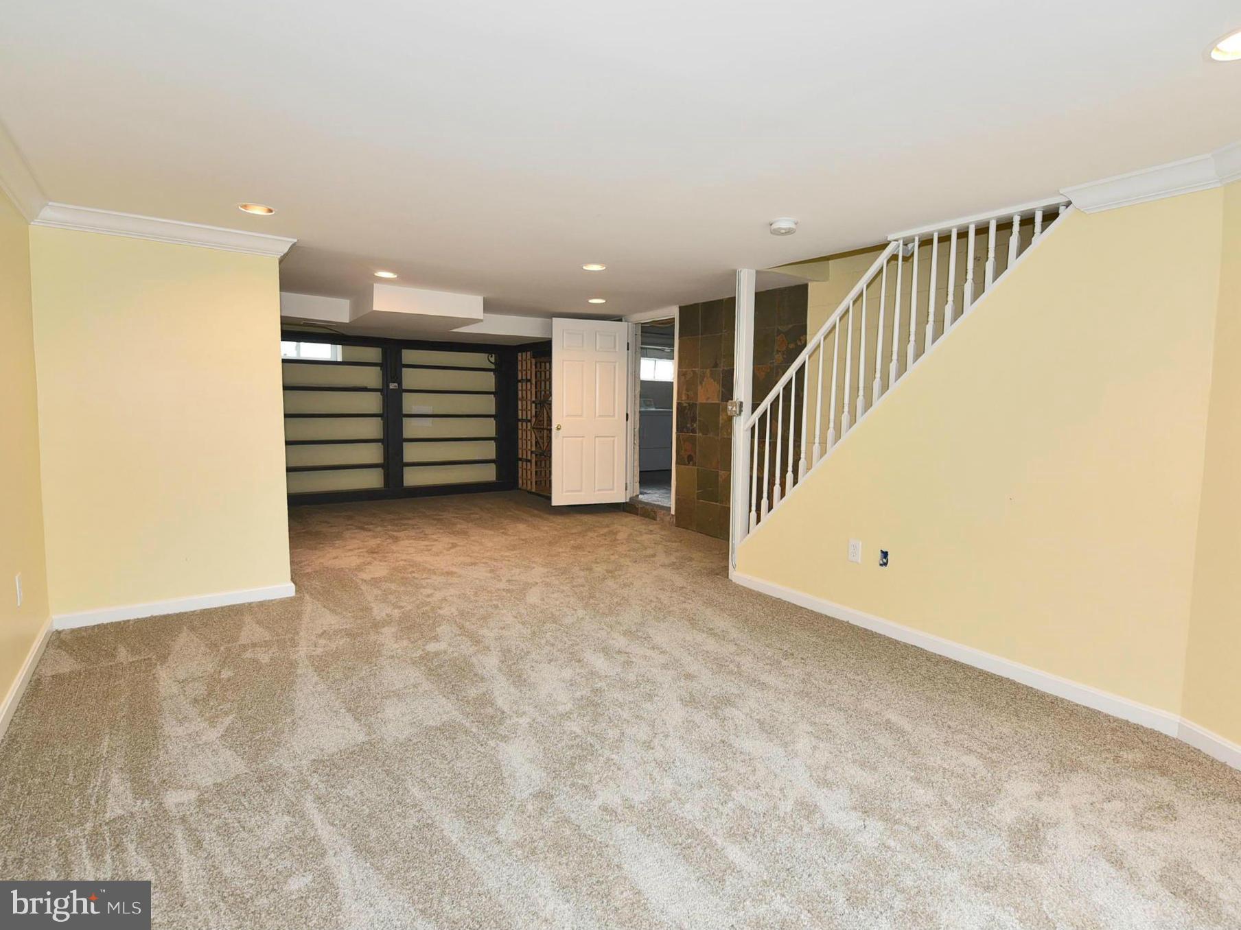 2138 Spencerville Road Spencerville, MD 20868 - Photo 20 of 30 a view of an empty room with stairs
