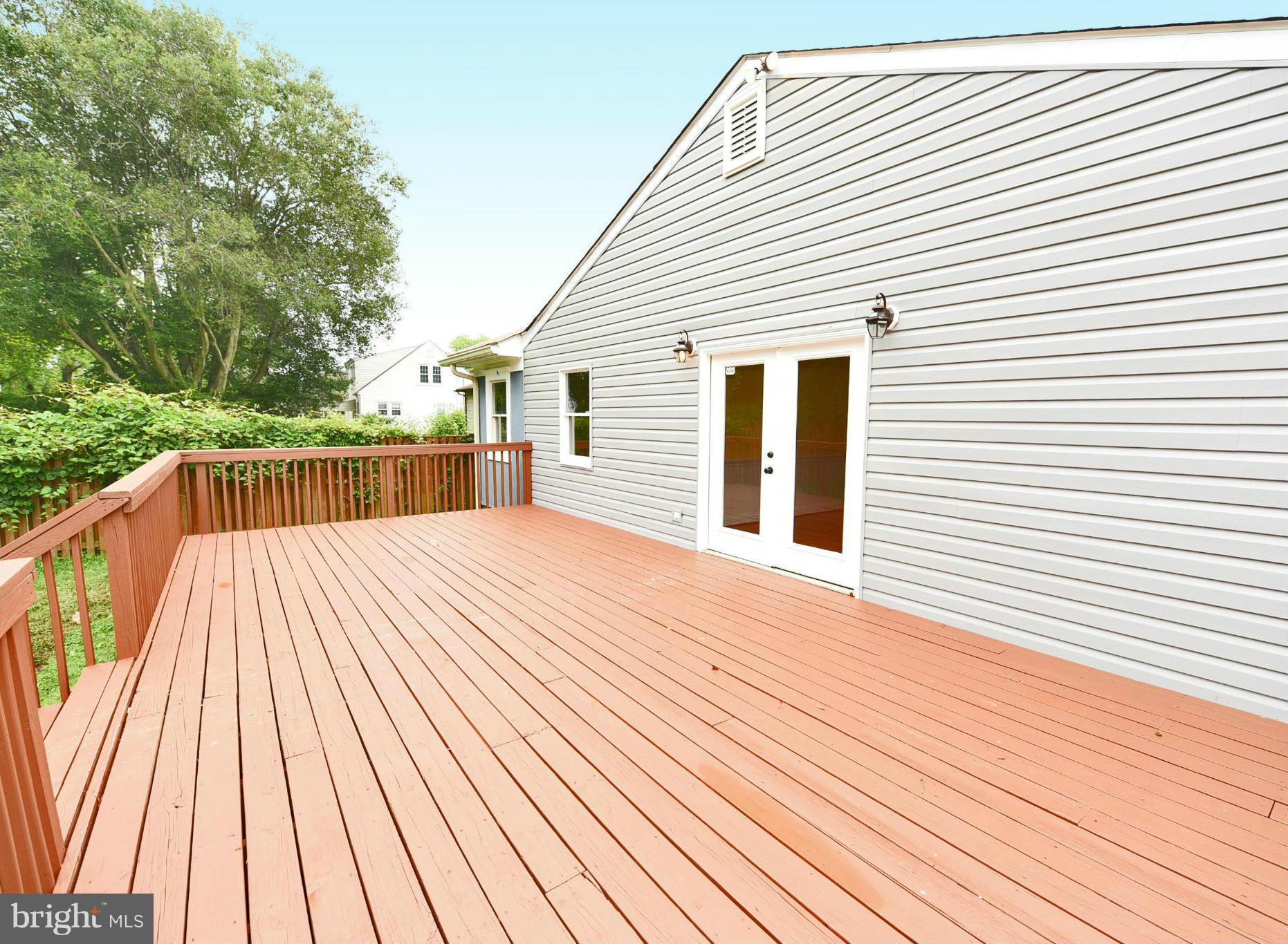 2138 Spencerville Road Spencerville, MD 20868 - Photo 22 of 30 a view of backyard with a deck