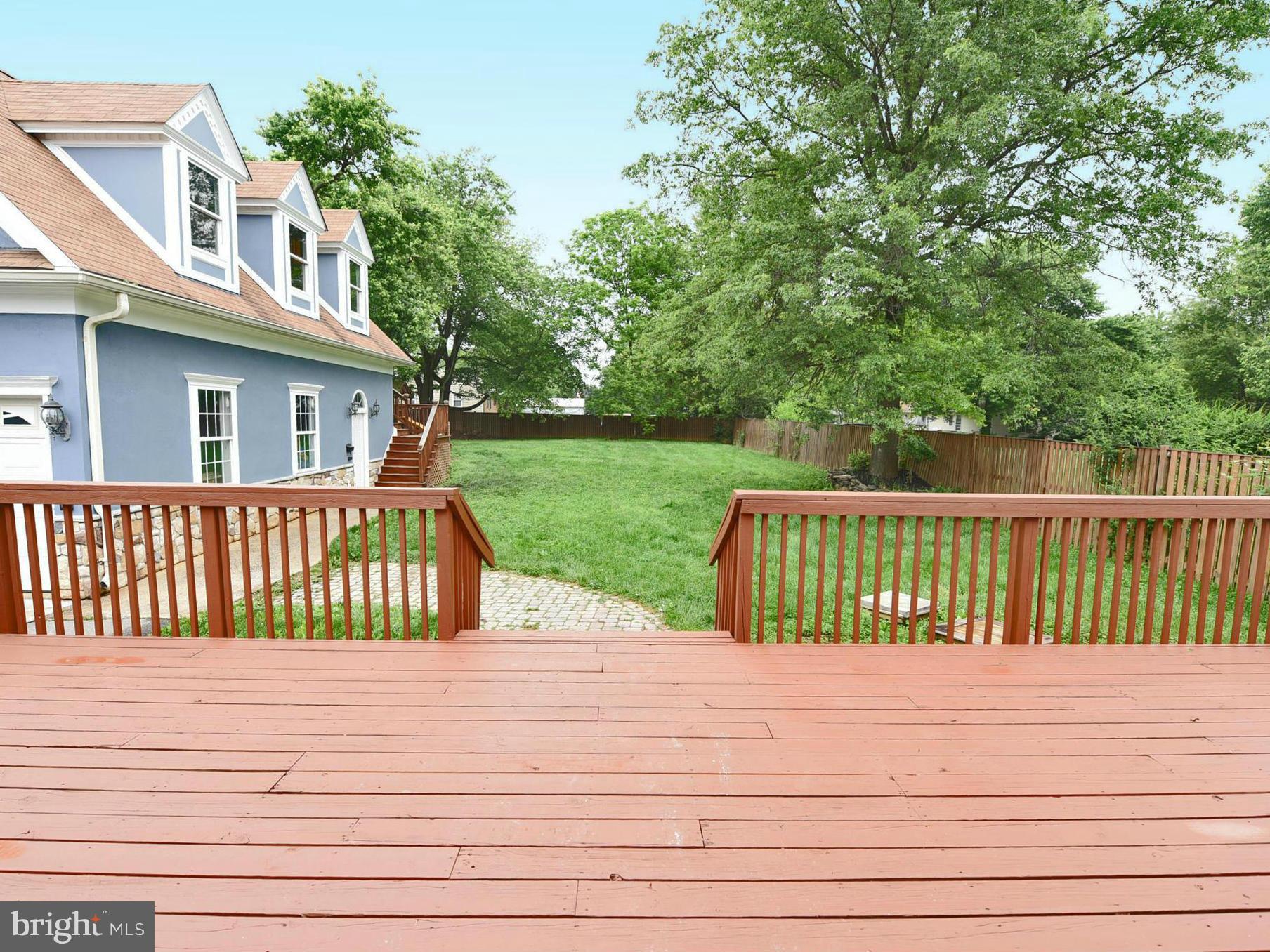 2138 Spencerville Road Spencerville, MD 20868 - Photo 23 of 30 a view of a wooden deck and yard