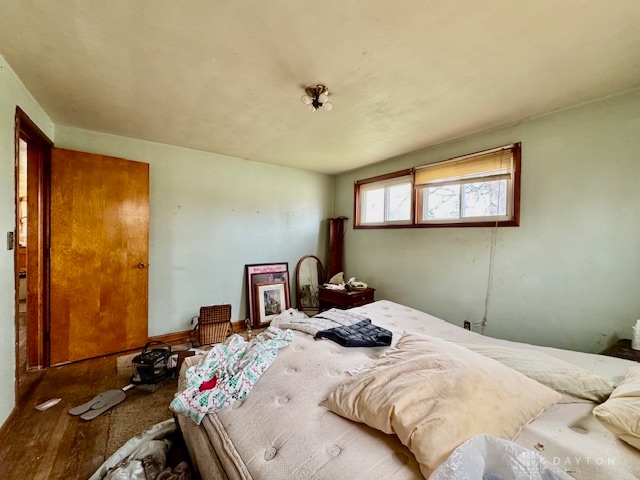 4733 Curtis Drive Springfield, OH 45503 - Photo 28 of 50 This spacious bedroom offers ample natural light and a classic aesthetic.