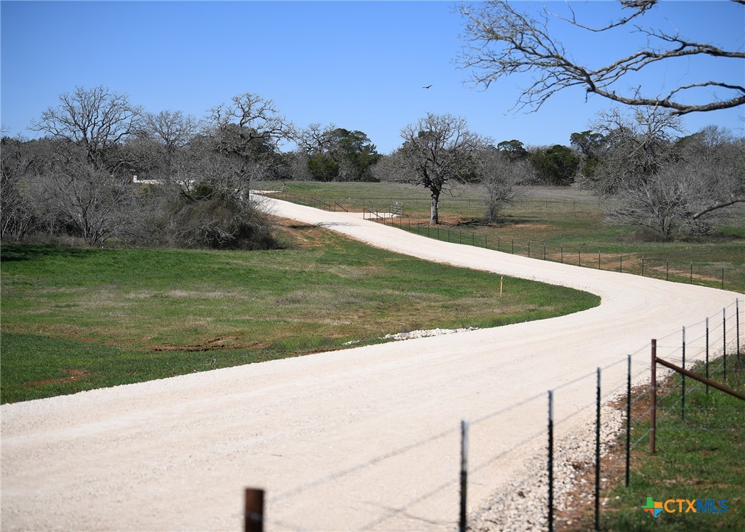 822 Main Loop Road Waelder, TX 78959 - Photo 8 of 8 a view of a water pond with green yard