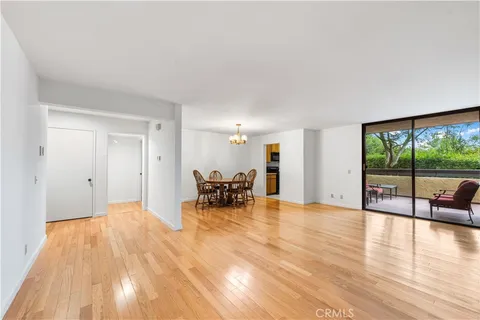 a view of livingroom with furniture and floor to ceiling window