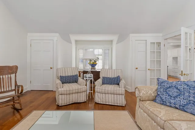 a living room with furniture and a couch
