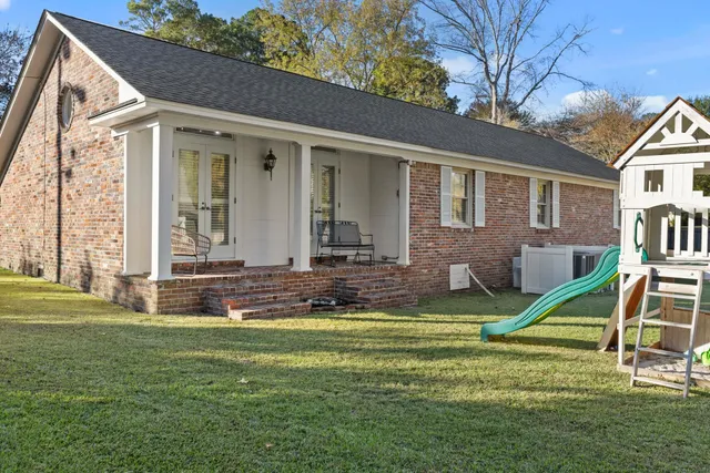 a front view of a house with a yard