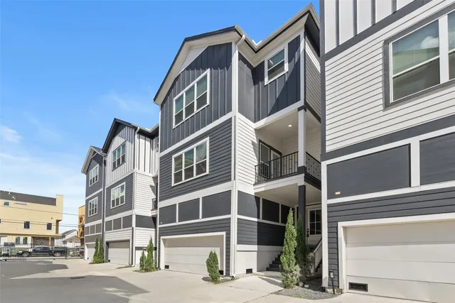 a front view of a building with a street