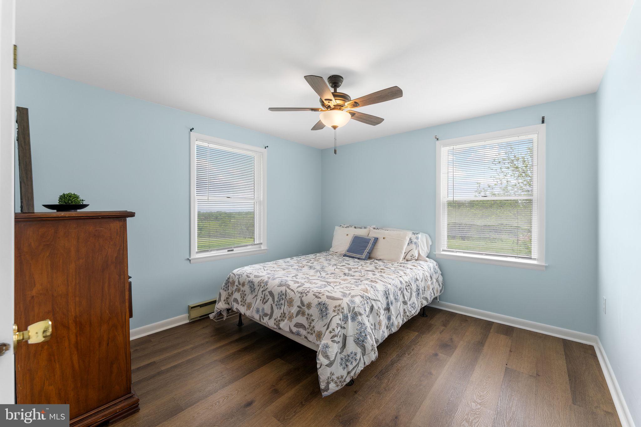 3296 Apple Pie Ridge Road Winchester, VA 22603 - Photo 27 of 61 a bedroom with a bed and a window