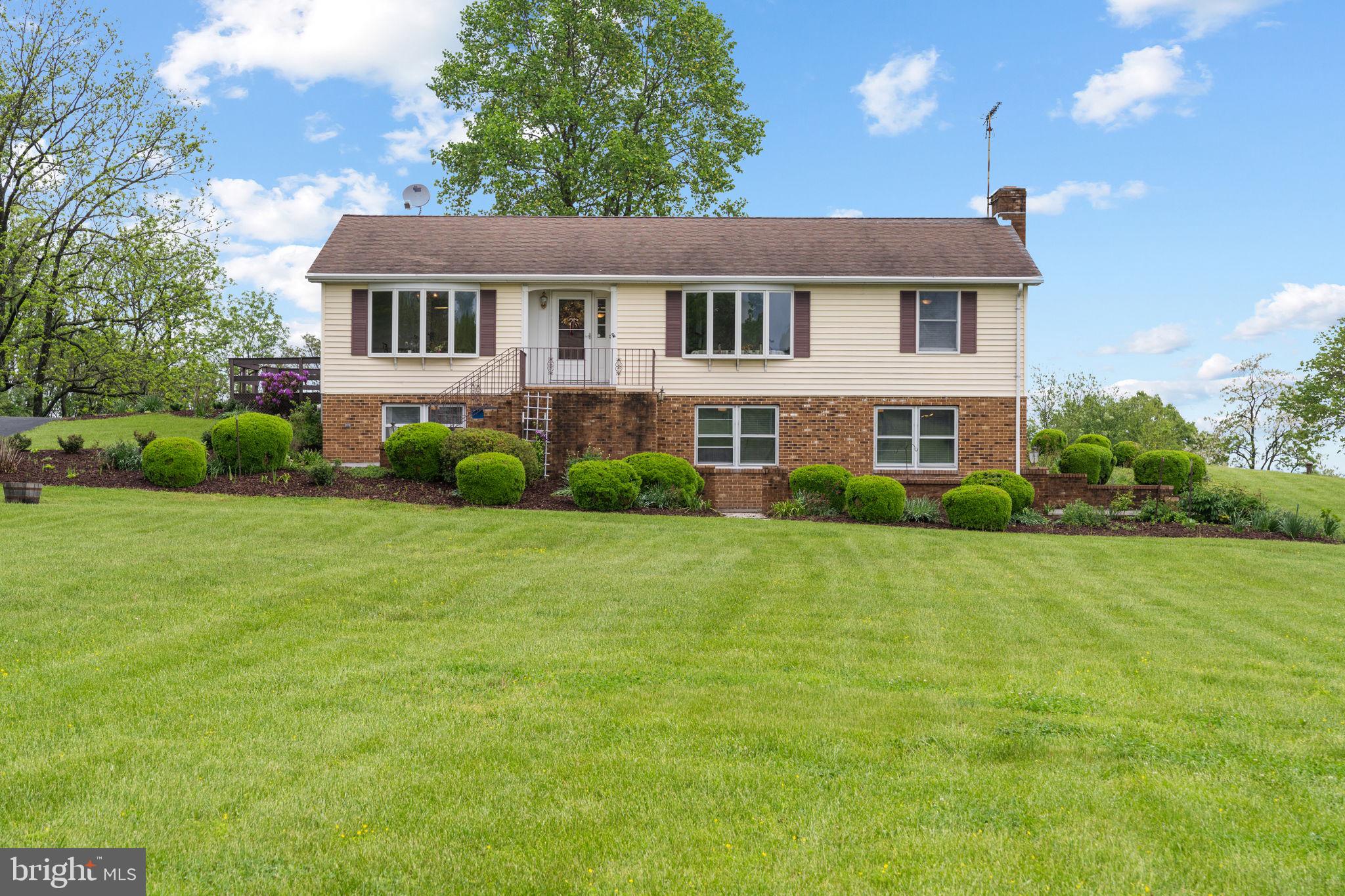 3296 Apple Pie Ridge Road Winchester, VA 22603 - Photo 3 of 61 a front view of a house with a yard