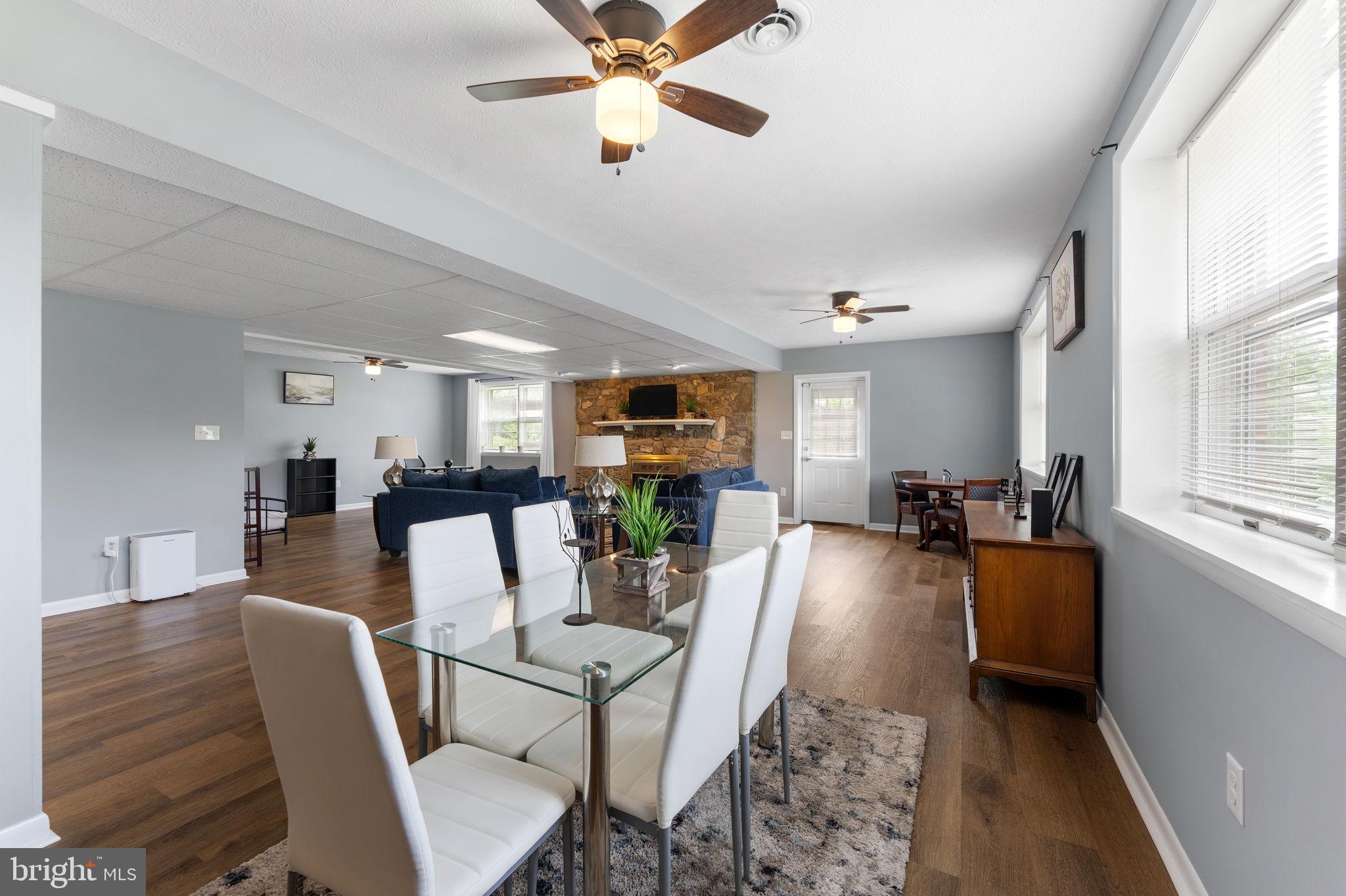 3296 Apple Pie Ridge Road Winchester, VA 22603 - Photo 36 of 61 a living room with furniture and kitchen view