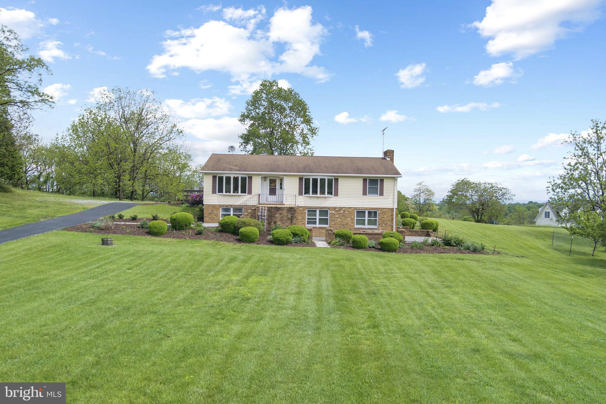 3296 Apple Pie Ridge Road Winchester, VA 22603 - Photo 4 of 61 a view of a house with a big yard