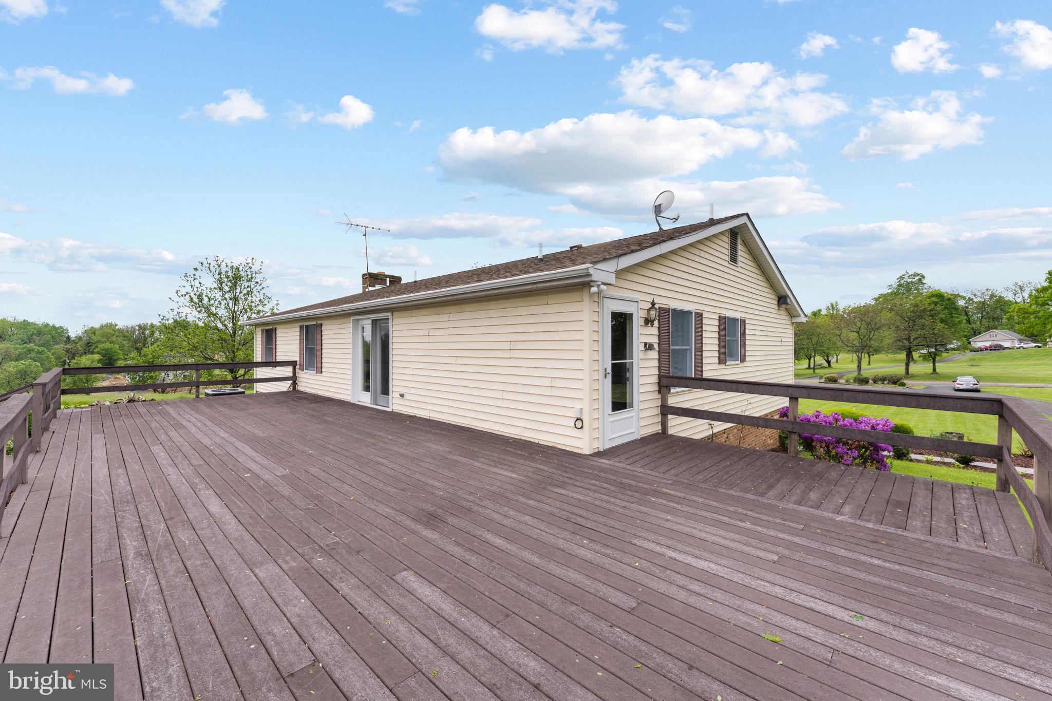 3296 Apple Pie Ridge Road Winchester, VA 22603 - Photo 54 of 61 a view of a house with wooden deck
