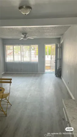 a view of empty room with windows