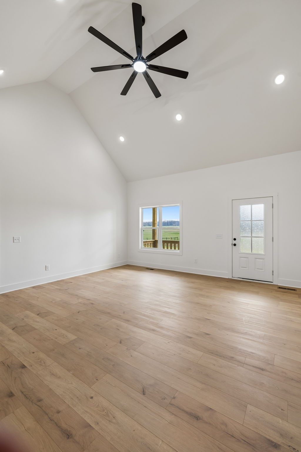 4083 Long Creek Road Lafayette, TN 37083 - Photo 7 of 36 an empty room with a empty space and a ceiling fan