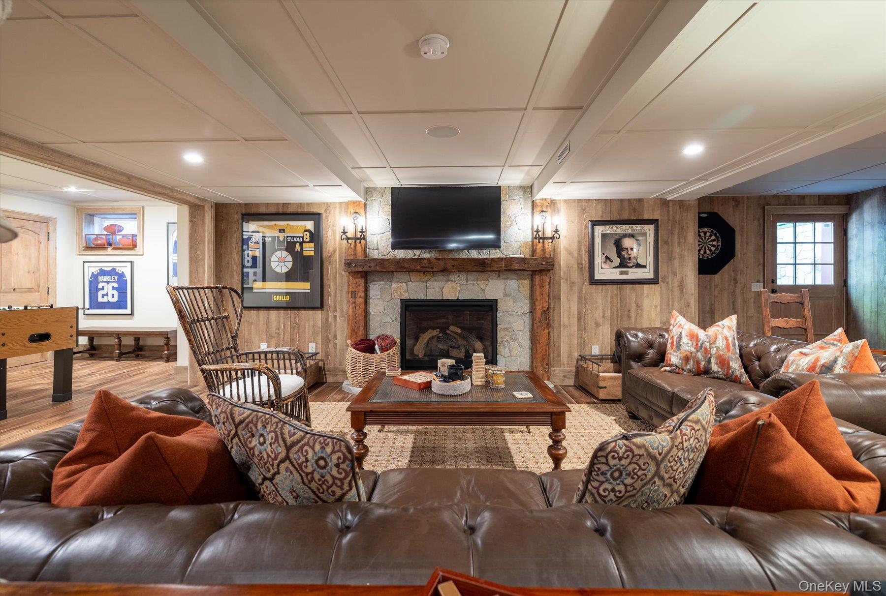 1750 Private Road, Unit 18 Mattituck, NY 11952 - Photo 13 of 49 a living room with furniture and a fireplace