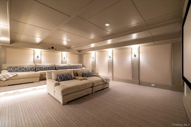 a view of hallway with furniture