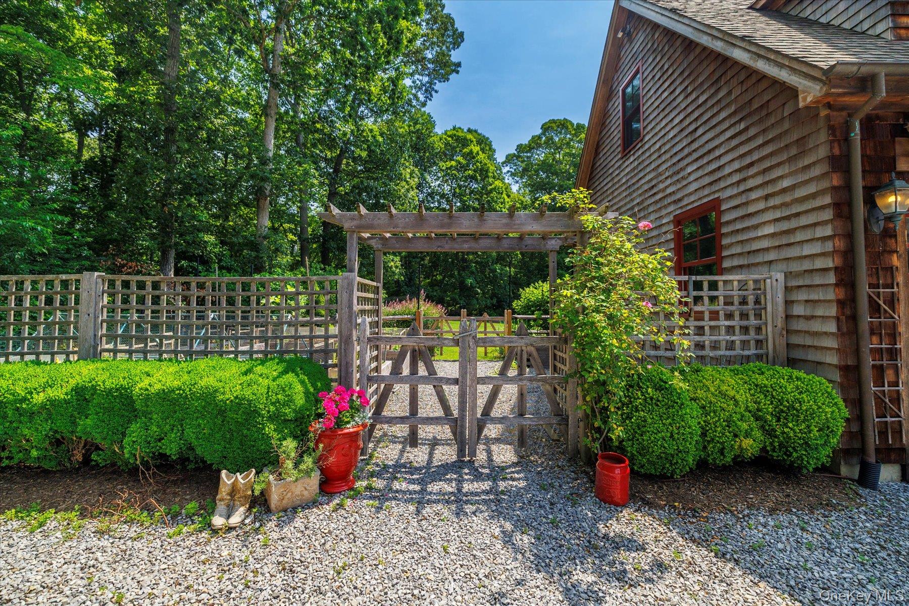 1750 Private Road, Unit 18 Mattituck, NY 11952 - Photo 44 of 49 a view of a garden with a plants