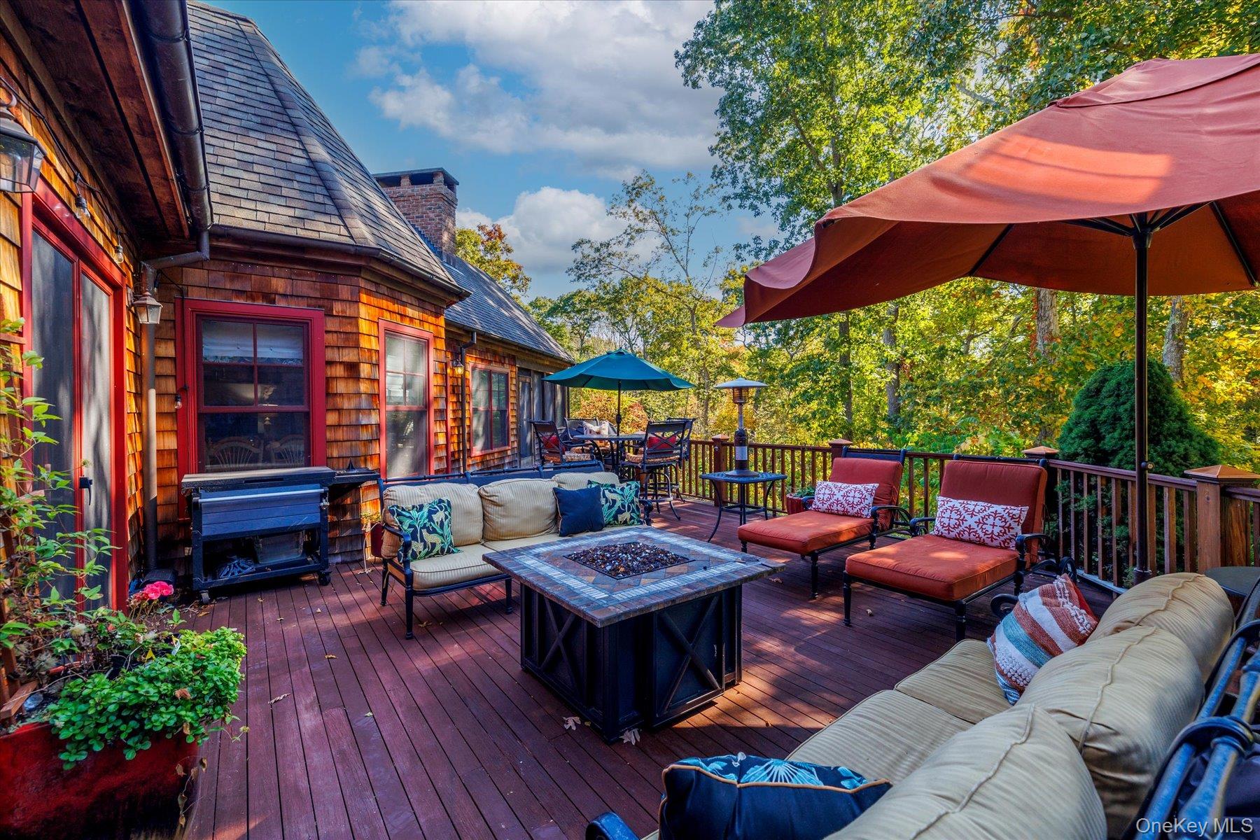 1750 Private Road, Unit 18 Mattituck, NY 11952 - Photo 7 of 49 a outdoor space with patio the couches and a potted plant