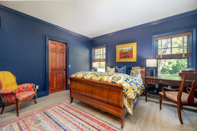 a living room with fireplace furniture and a flat screen tv