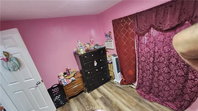 a bathroom with a toilet sink and shower