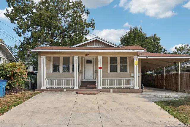 a front view of a house with a porch