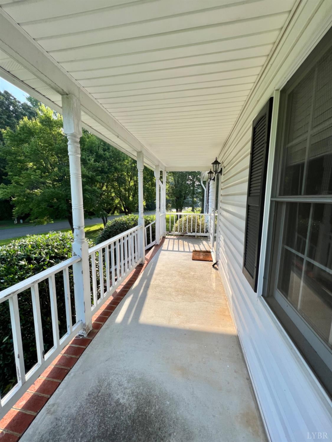 202 Sugar Mill Drive Amherst, VA 24521 - Photo 19 of 41 a view of porch with furniture
