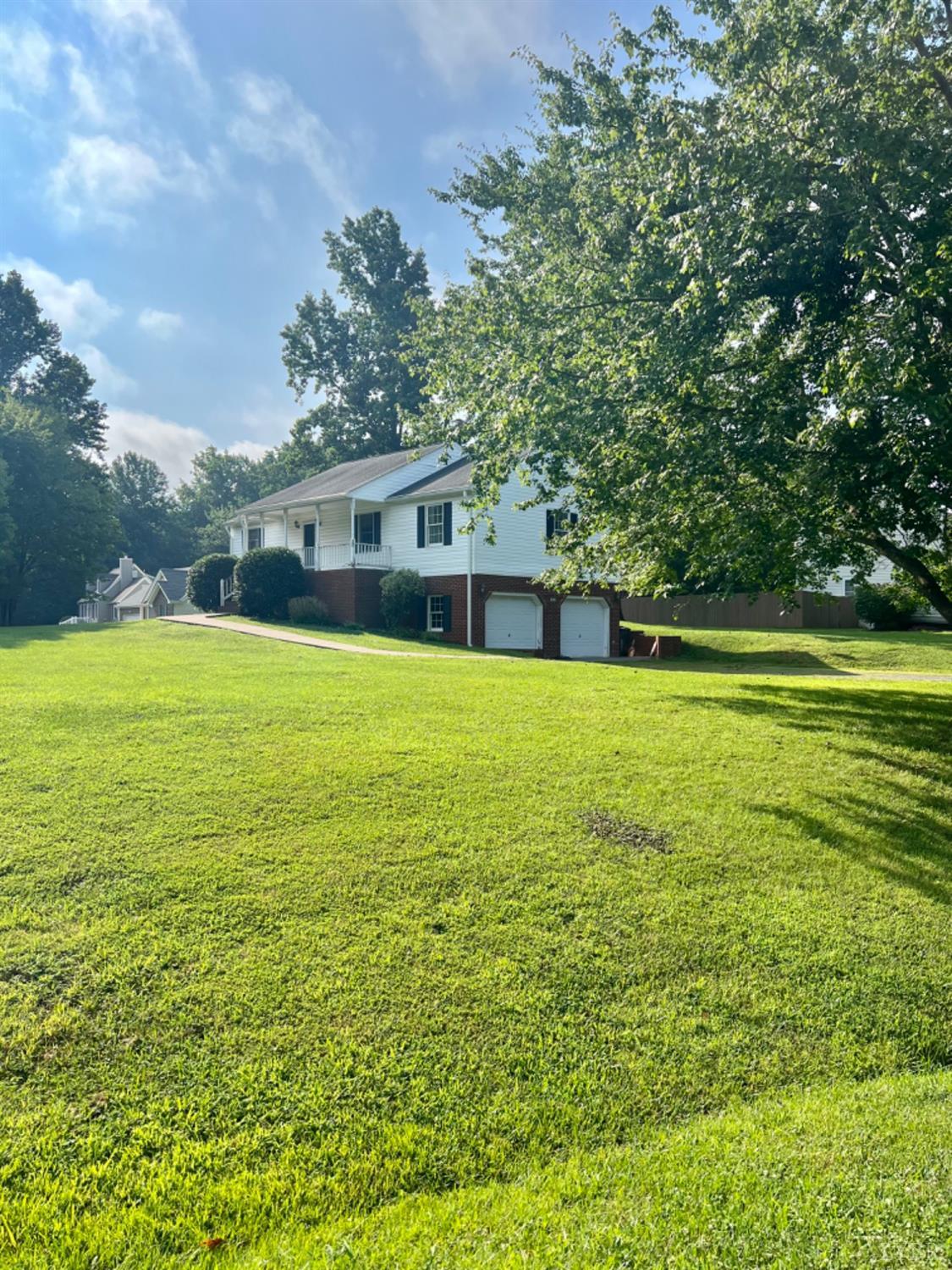 202 Sugar Mill Drive Amherst, VA 24521 - Photo 21 of 41 a view of a house with a big yard