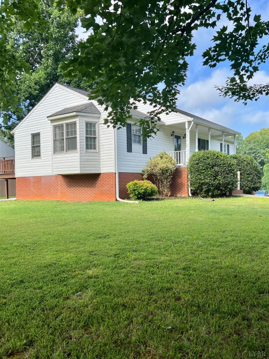 202 Sugar Mill Drive Amherst, VA 24521 - Photo 27 of 41 a front view of house with yard and green space