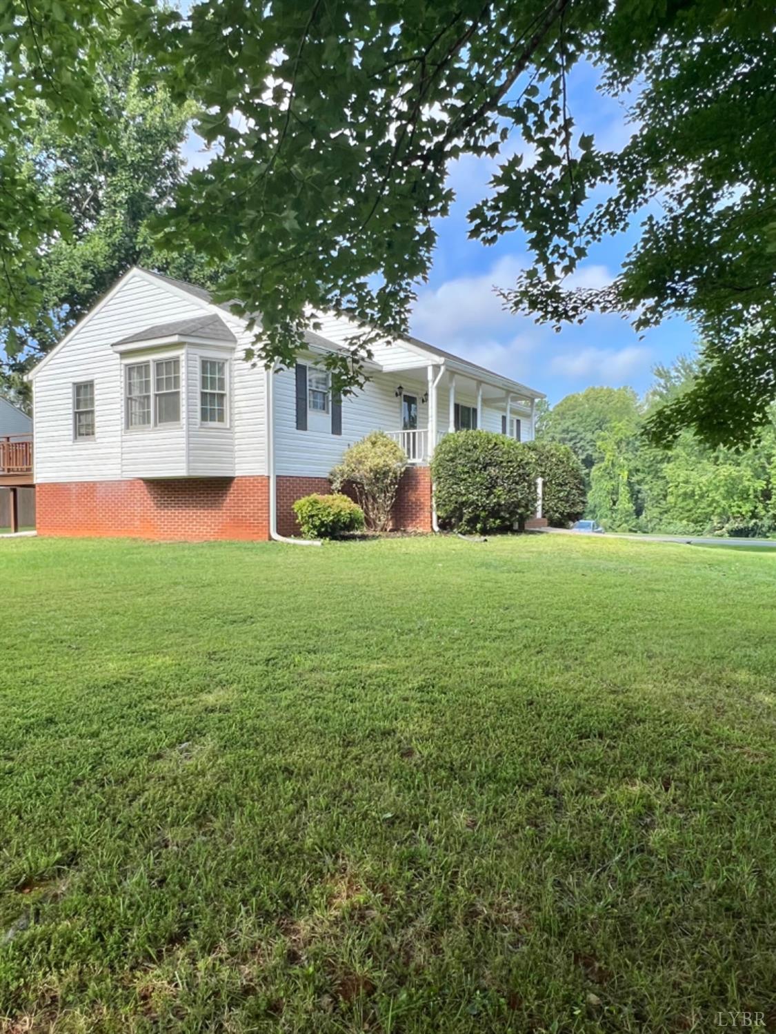202 Sugar Mill Drive Amherst, VA 24521 - Photo 28 of 41 a front view of a house with yard and green space