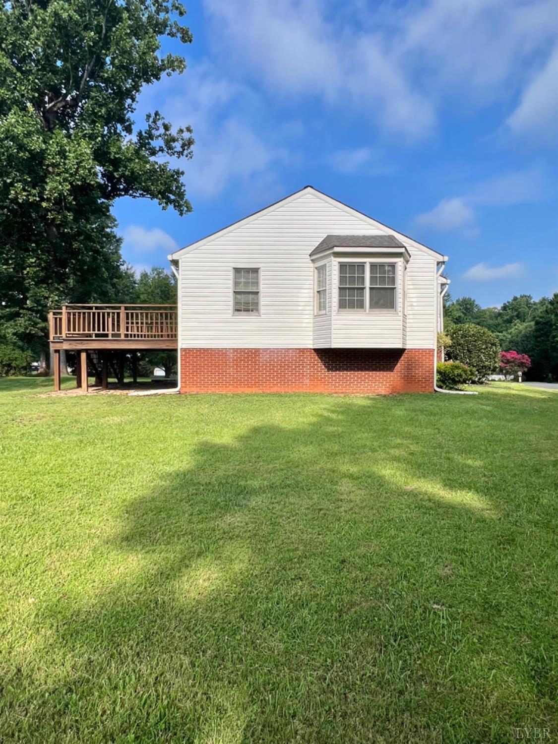202 Sugar Mill Drive Amherst, VA 24521 - Photo 29 of 41 a view of a house with a yard