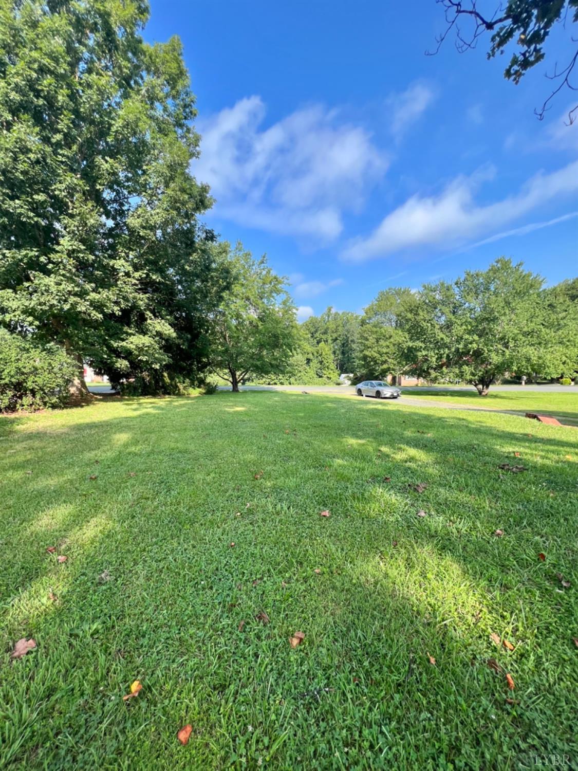 202 Sugar Mill Drive Amherst, VA 24521 - Photo 35 of 41 a view of a grassy field with trees