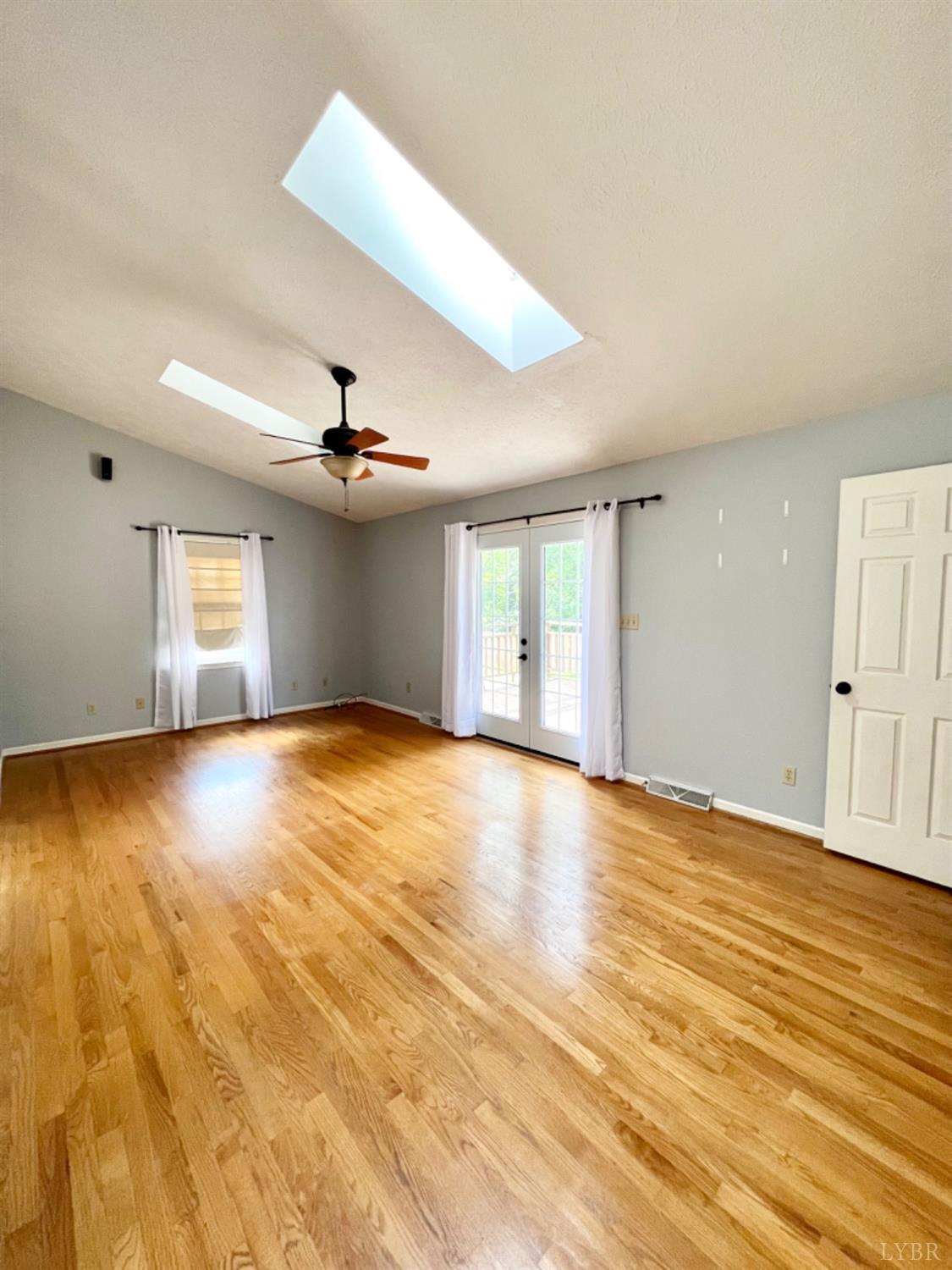 202 Sugar Mill Drive Amherst, VA 24521 - Photo 8 of 41 a view of empty room with wooden floor