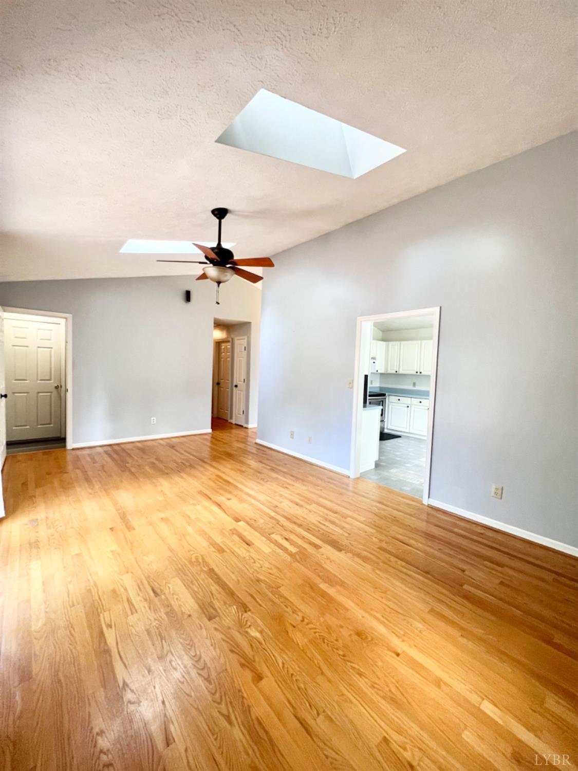 202 Sugar Mill Drive Amherst, VA 24521 - Photo 10 of 41 a view of empty room with wooden floor