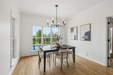 a kitchen with stainless steel appliances a refrigerator and a stove top oven