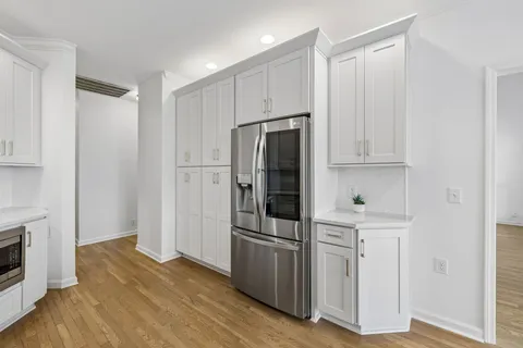 a bathroom with a sink a vanity and a mirror