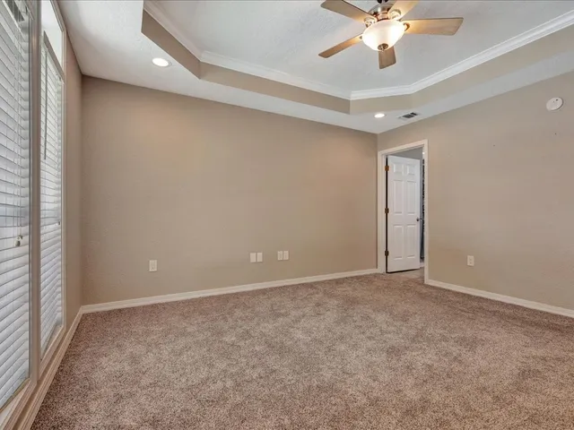 a bathroom with a sink a large mirror and a bathtub