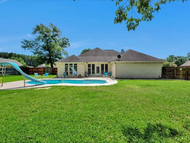 a view of a park with a slide
