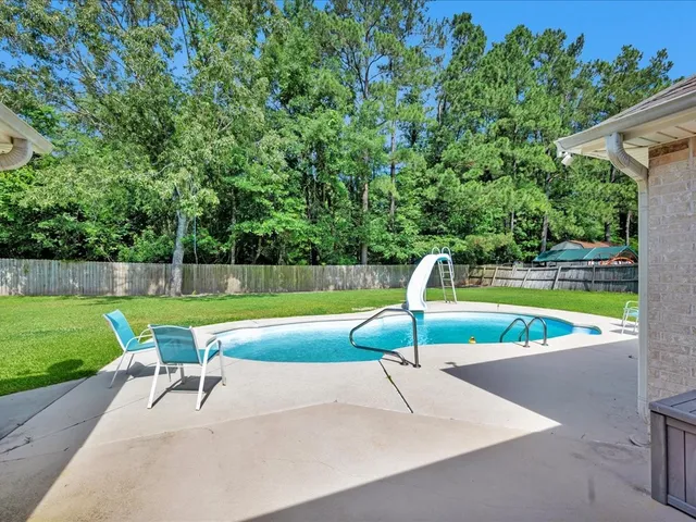a picture of a bench in a bathroom