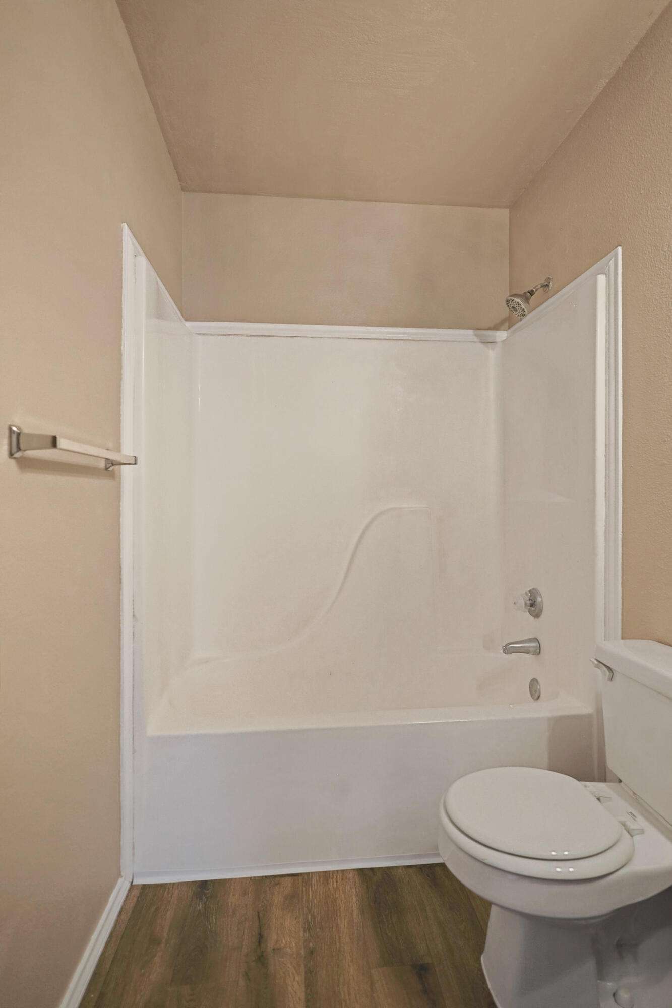 5903 10th Street, Unit 2 Lubbock, TX 79416 - Photo 33 of 47 a bathroom with a toilet and a shower