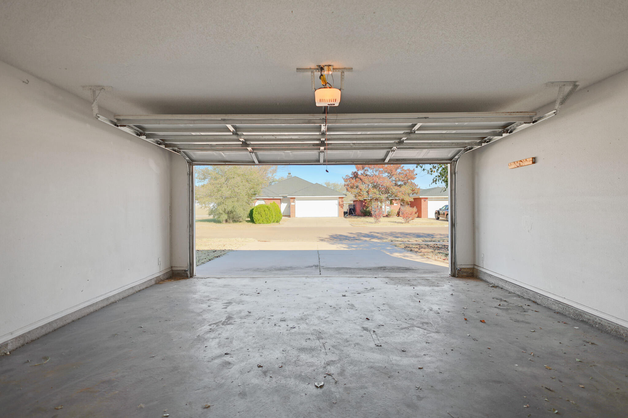 5903 10th Street, Unit 2 Lubbock, TX 79416 - Photo 36 of 47 a view of room with wooden floor and window