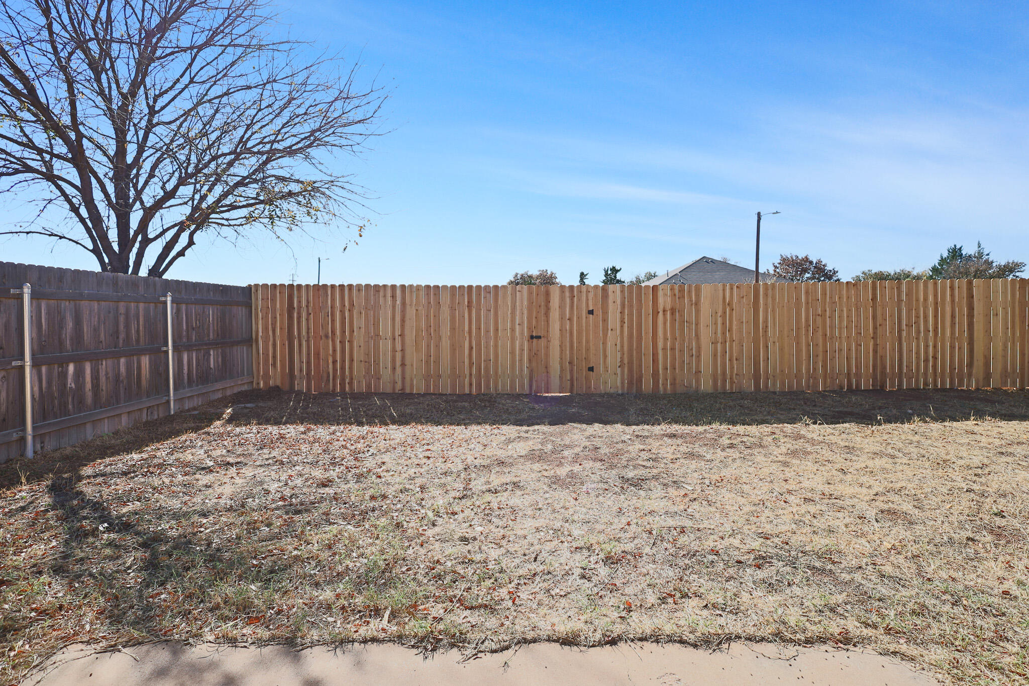 5903 10th Street, Unit 2 Lubbock, TX 79416 - Photo 39 of 47 a view of wooden fence