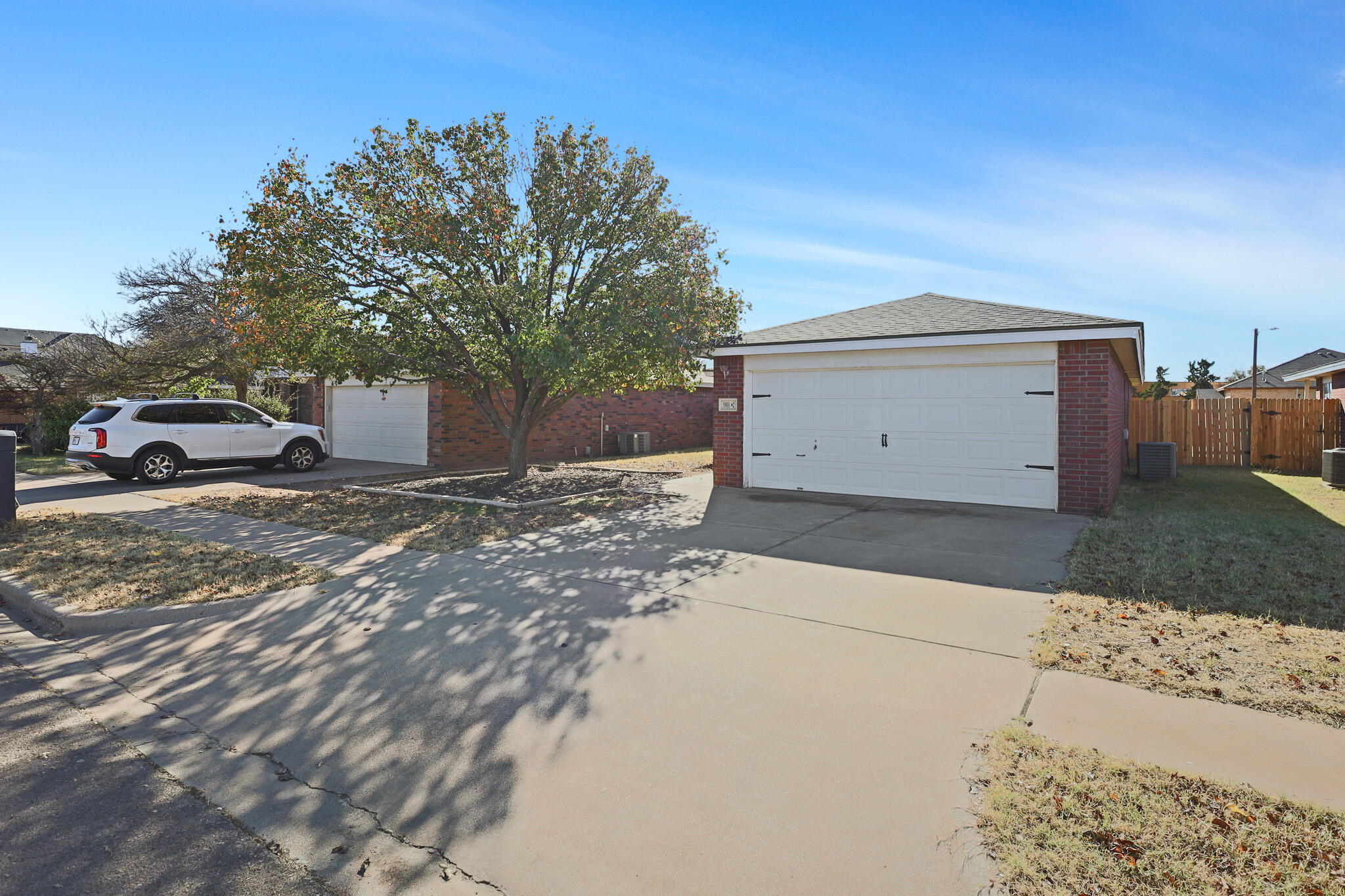 5903 10th Street, Unit 2 Lubbock, TX 79416 - Photo 44 of 47 a view of street and electric pole on a road