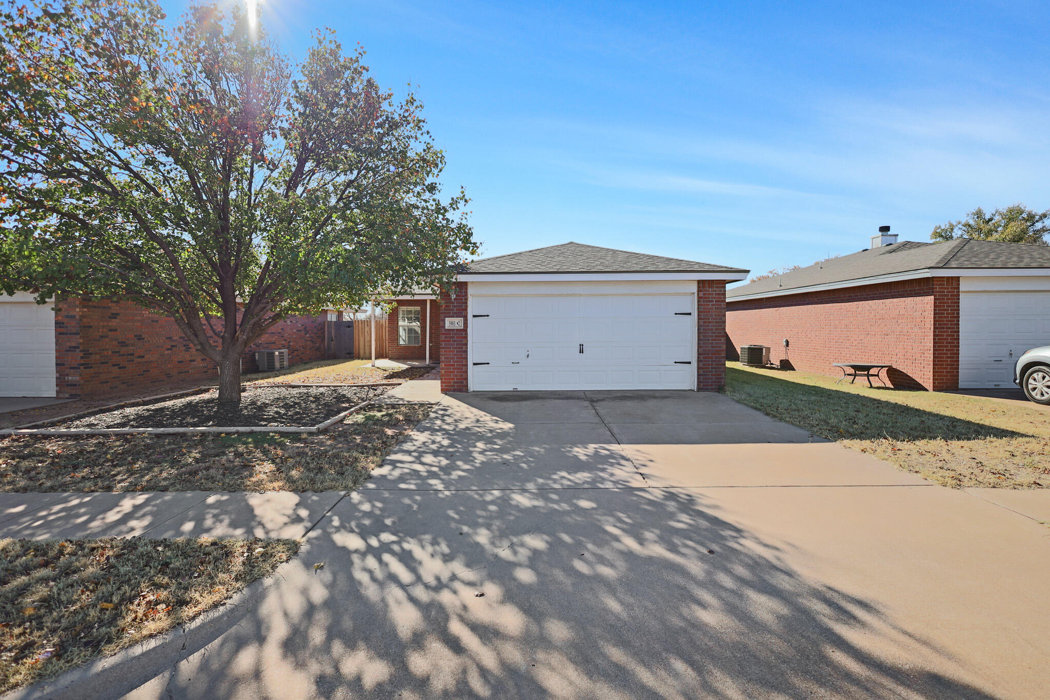 5903 10th Street, Unit 2 Lubbock, TX 79416 - Photo 45 of 47 a view of a backyard of a house