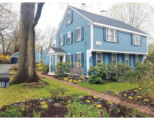 72 Main Street Framingham, MA 01702 - Photo 1 of 28 a front view of a house with a yard