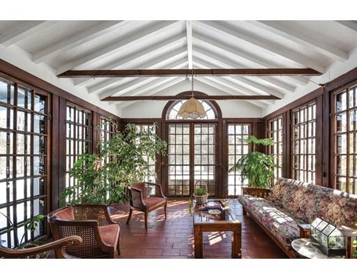 72 Main Street Framingham, MA 01702 - Photo 12 of 28 a living room with furniture and floor to ceiling windows