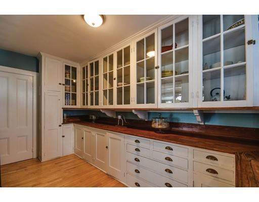 72 Main Street Framingham, MA 01702 - Photo 13 of 28 a kitchen with granite countertop a sink and cabinets