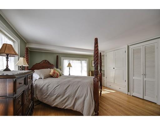 72 Main Street Framingham, MA 01702 - Photo 21 of 28 a bedroom with a bed and a window