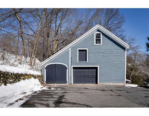 72 Main Street Framingham, MA 01702 - Photo 27 of 28 a backyard of a house with wooden fence