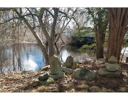 72 Main Street Framingham, MA 01702 - Photo 3 of 28 a view of a backyard of the house